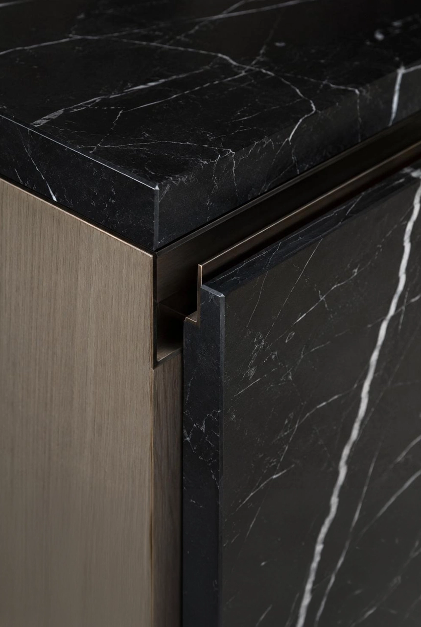 X4 Design and Build luxury black marble countertop detail with wood cabinet side panel, concealed shadow gap, precise stone edge, and premium fit-out finishing